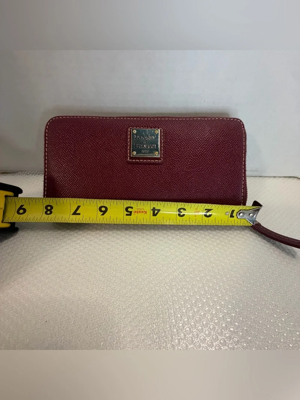 Dooney & Bourke Wine Textured Zip Wallet with Gold Plaque